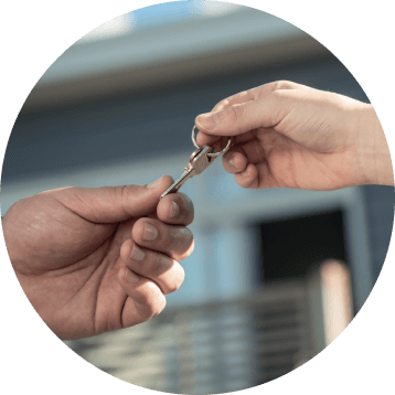 hands exchanging keys